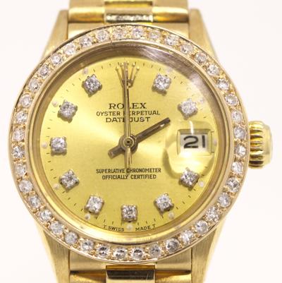Ladies Rolex President, 18kt gold with diamond bezel