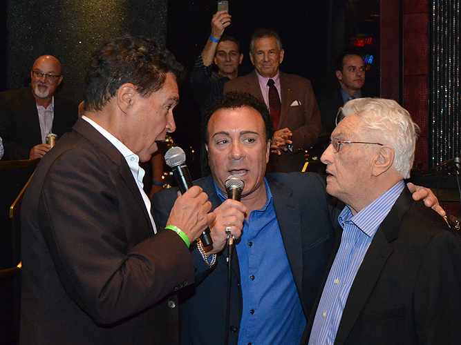 Clint Holmes and Frankie Scinta congratulate Tommy DeVito on his 86th birthday and the release of the Jersey Boys movie