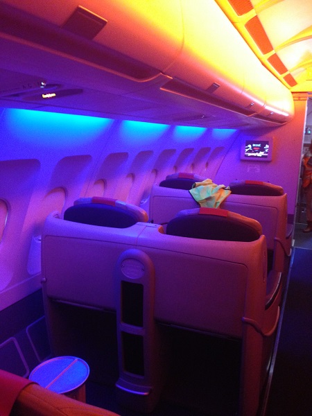 The interior of a Las Vegas Airlines plane has a nightclub atmosphere
